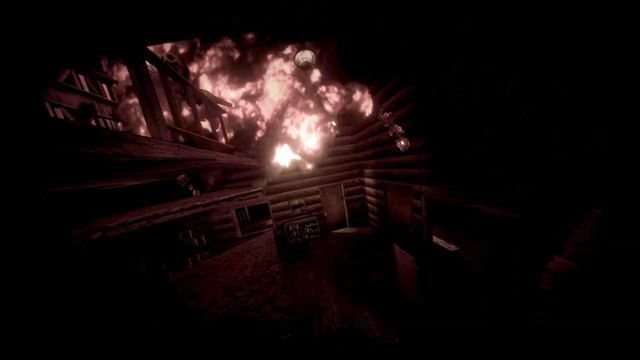 Fire bursting through the roof of a dark cabin